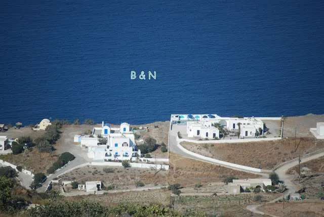 exploring the white houses of Oia village in Santorini in Greece