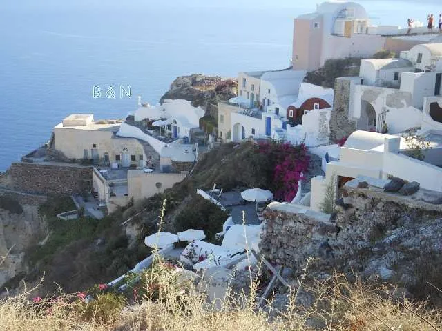 exploring the white houses of Oia village in Santorini in Greece