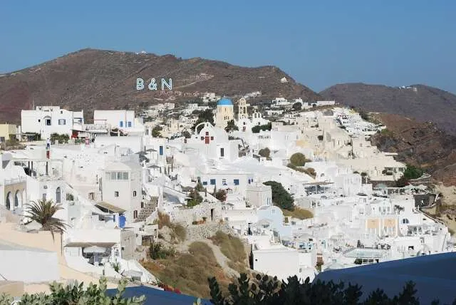 enjoying the white houses of Santorini in Greece