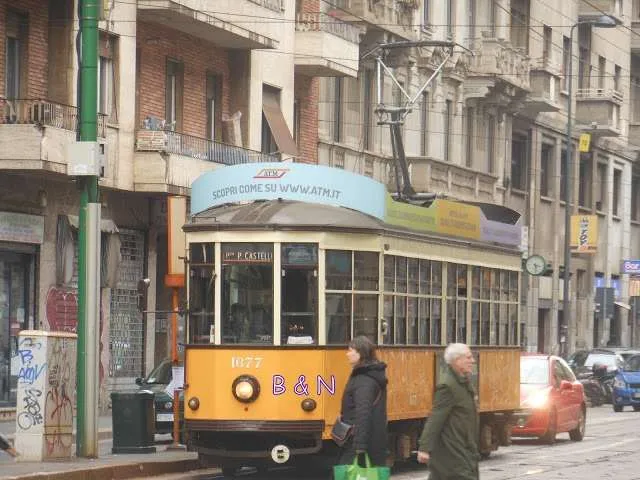 travelers exploring Milan in Italy