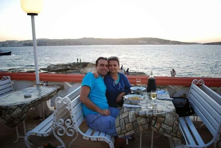 Dinner with wine and sunset in Buggiba, Malta island
