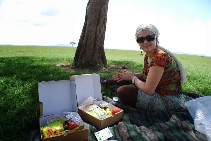 picnic, safari and village in Maasai Mara National Reserve in Kenya