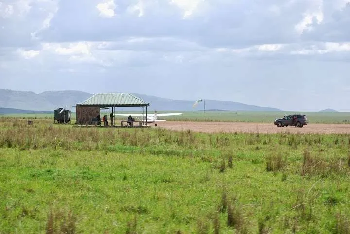 picnic, safari and village in Maasai Mara National Reserve in Kenya
