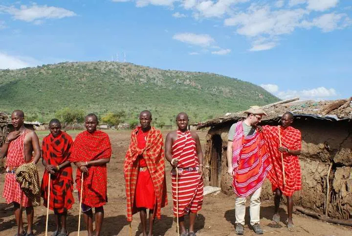 picnic, safari and village in Maasai Mara National Reserve in Kenya