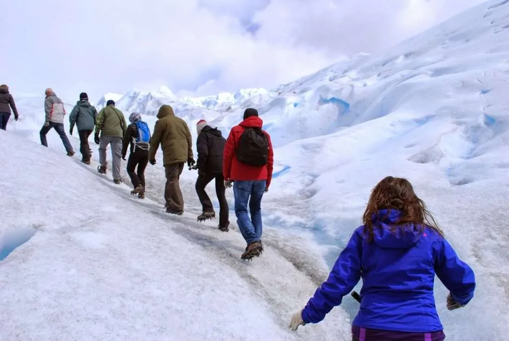 walking and falling on ice on the Perito Moreno Glacier in Argentina