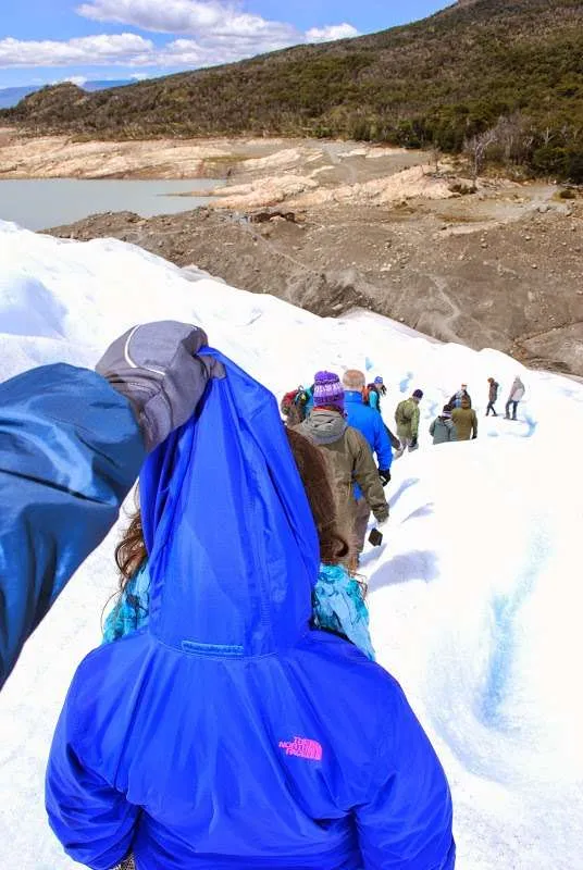 walking and falling on ice on the Perito Moreno Glacier in Argentina