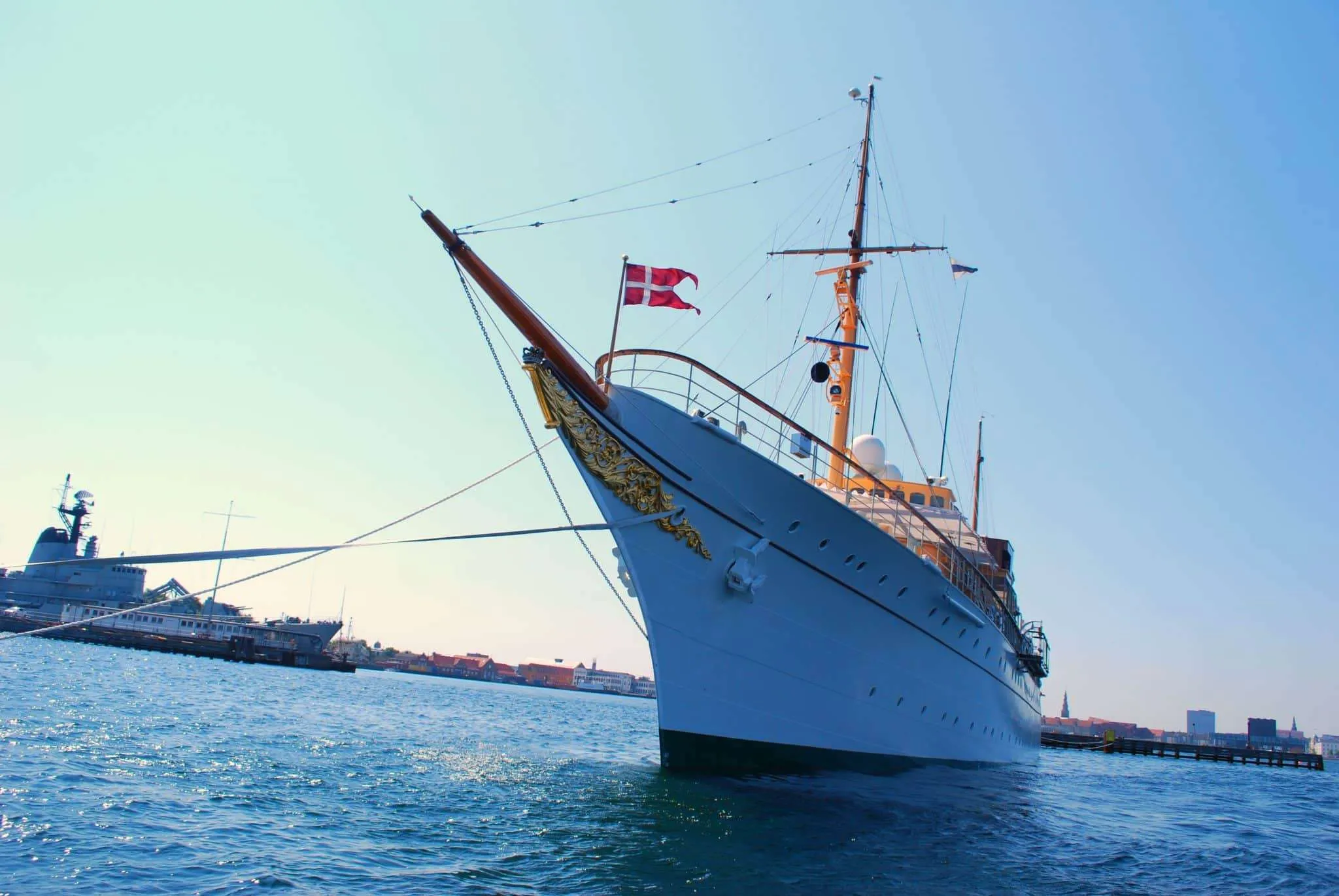 The famous Danish flag saying hi from a majestic water vessel in Copenhagen