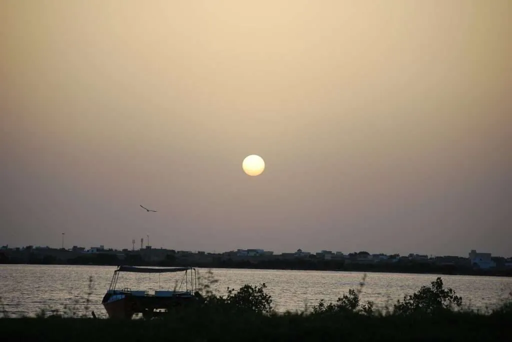 Senegal, Saint Louis, fishermen, bridge, river, boats, kids, streets, dirt, junk, beaches, sunset, carraige, sunrise