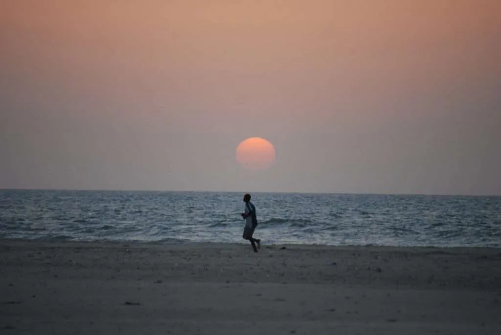 Senegal, Saint Louis, fishermen, bridge, river, boats, kids, streets, garbage, dirty, beaches, sunset, carriage