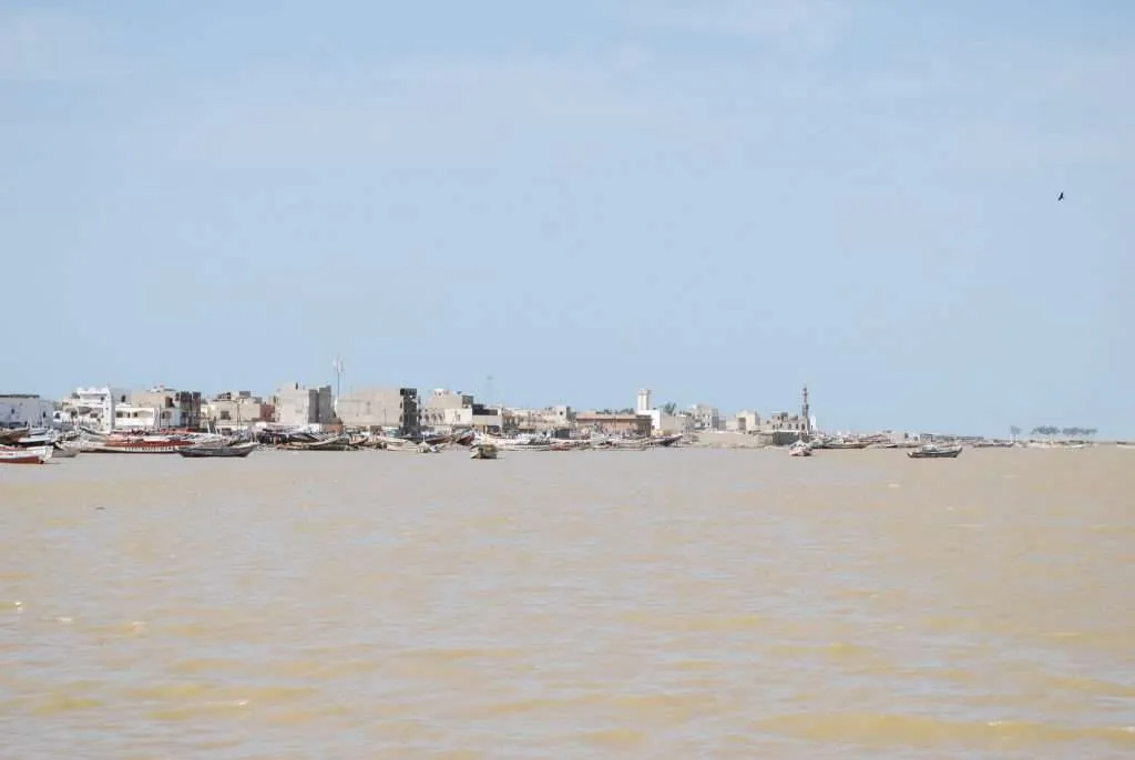 Senegal, Saint Louis, fishermen, bridge, river, boats, kids, streets, garbage, dirty, beaches, sunset