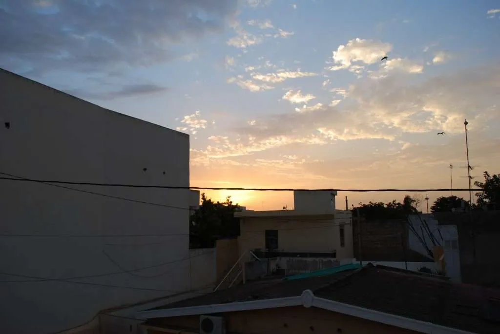 Travel to Senegal, Dakar, sunrise, buildings, sun