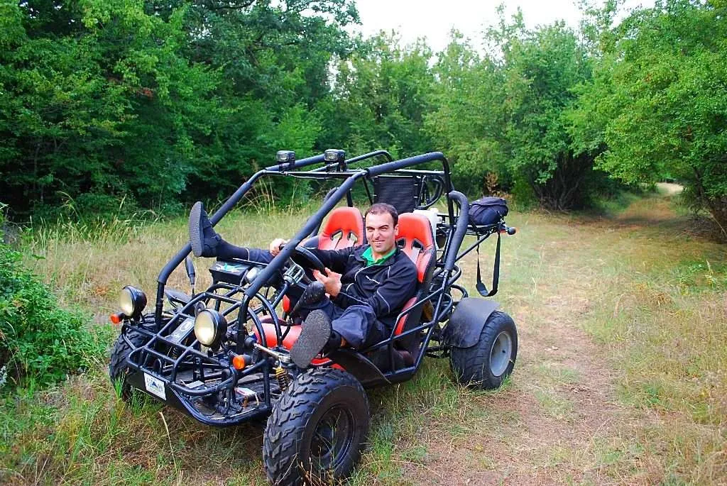 Driving a buggy in the woods of Dobrogled, Bulgaria