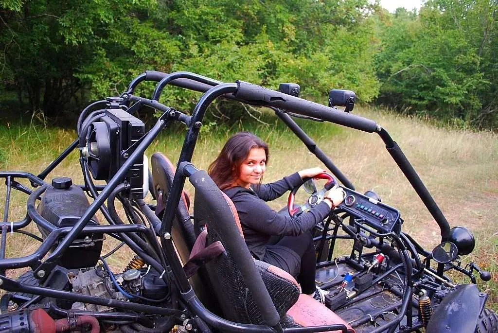 Driving a buggy in the woods of Dobrogled, Bulgaria