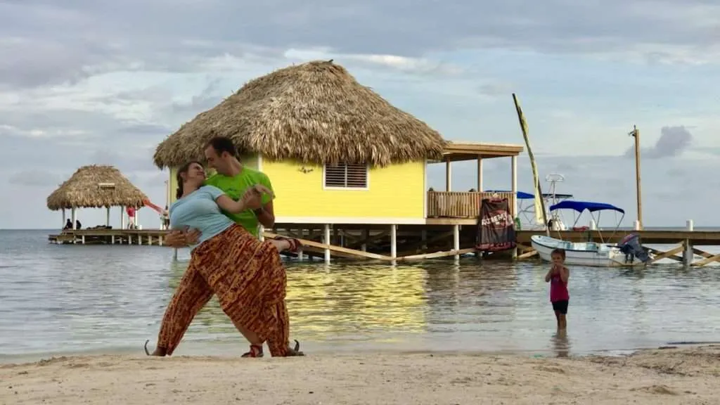 We are dancing on the beach in San Pedro, Belize