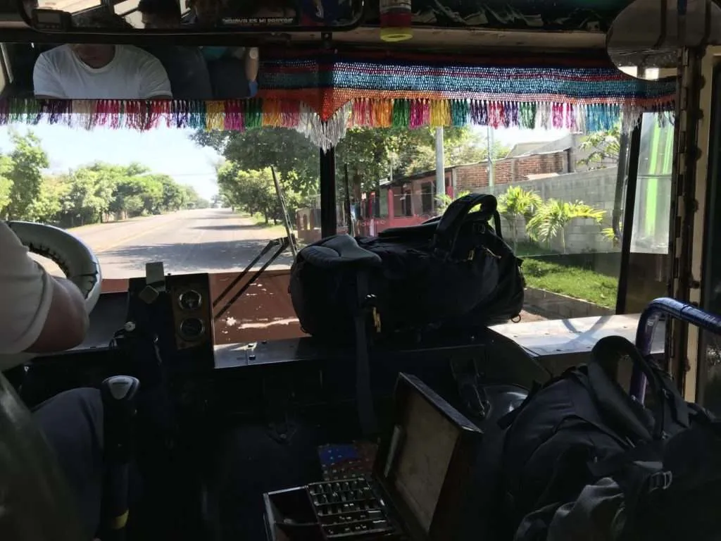 Our backpacks in the chicken bus to Santa Ana, El Salvador
