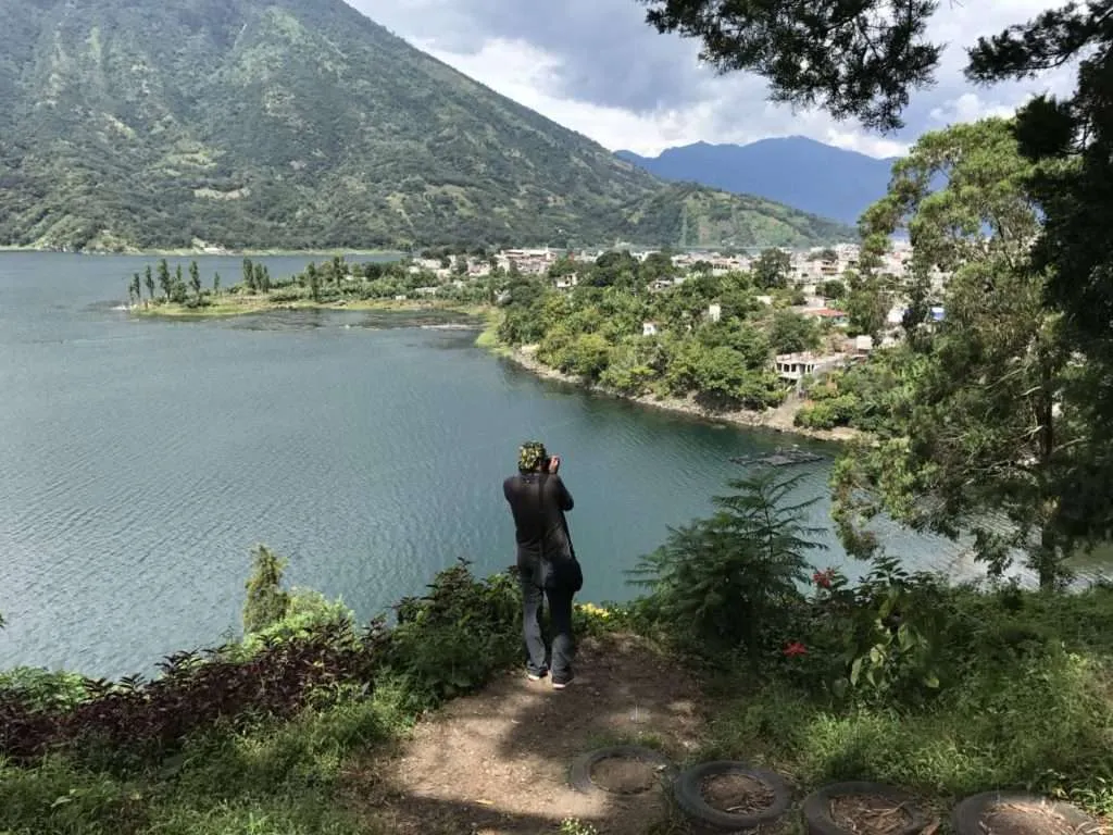 Taking photos over the lake Atitlan and Santiago Atitlan village in Guatemala