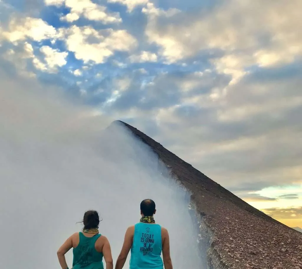 We are standing on the edge of Telica Volcano's crater near Leon in Nicaragua