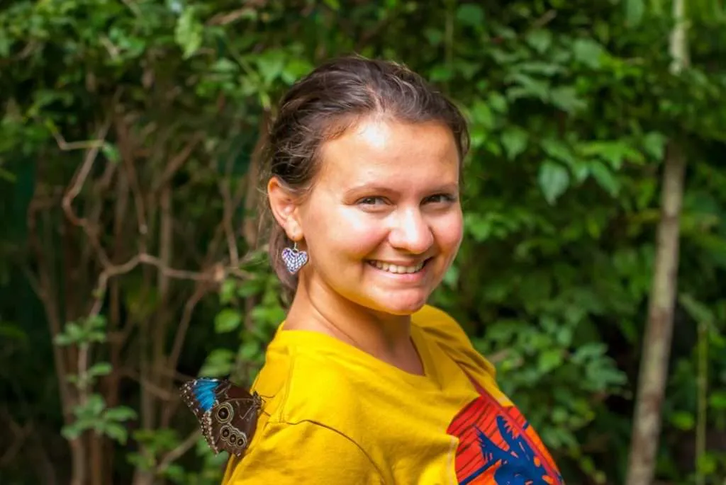 Blue butterfly landed on Bistra's shoulder in Monteverde National Park Costa Rica
