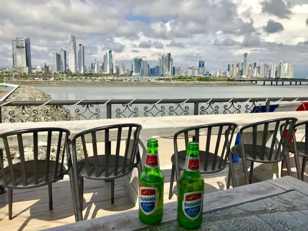 Having a beer with a view towards the skyscrapers of Panama City in Panama