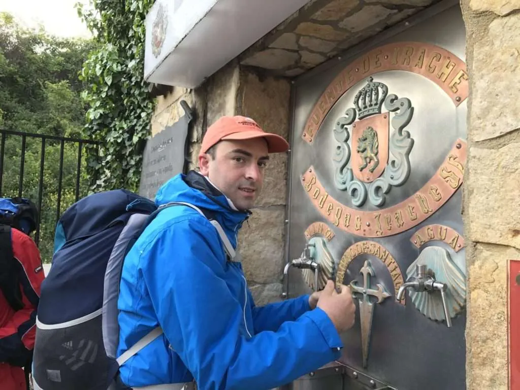 Drinking from the wine fountain near Estella, Camino de Santiago, Spain