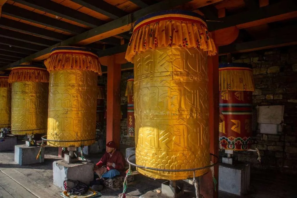 Bhutan - people, country, culture, Buddhists praying, wheels with mantras