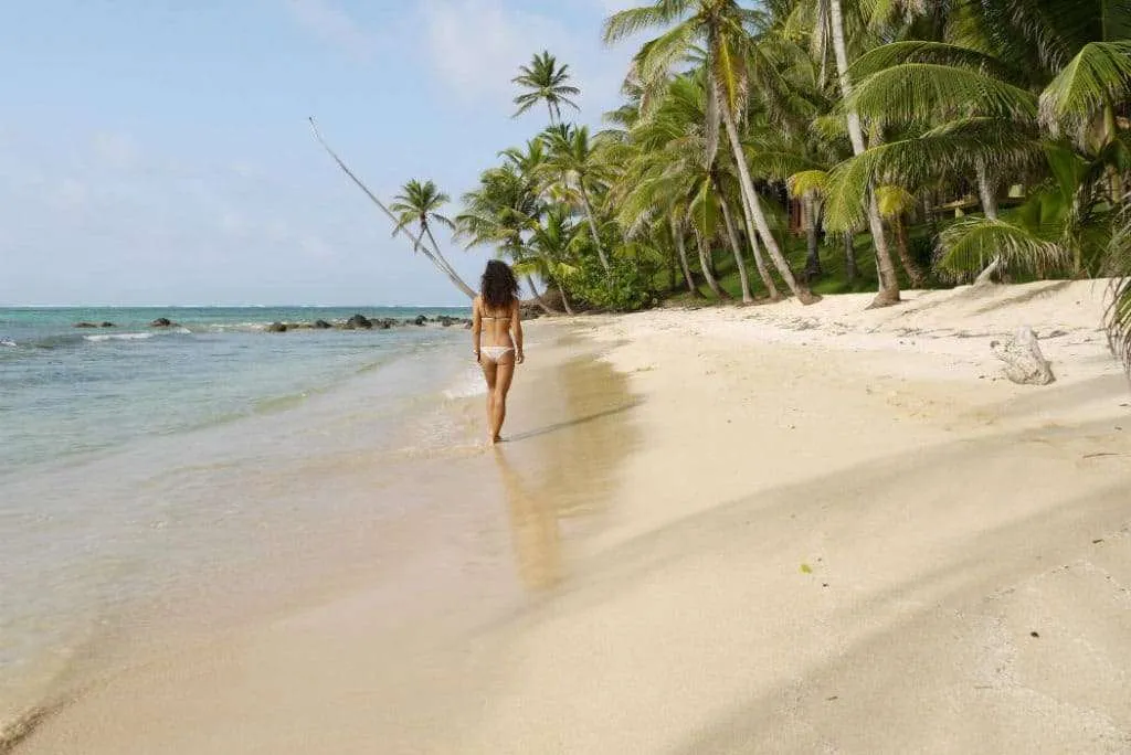 Alya, Stingy Nomads walking on Otto Beach Little Corn Island Nicaragua
