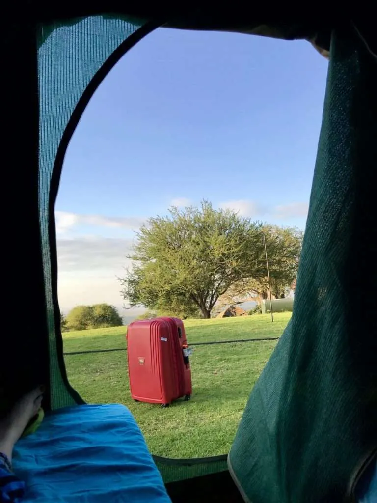 Tanzania and Zanzibar itinerary - Migombani Camp, suitcase in front of tent, funny travel quotes