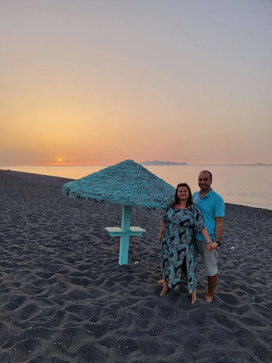 Sunrise at Perissa beach, Santorini, Greece