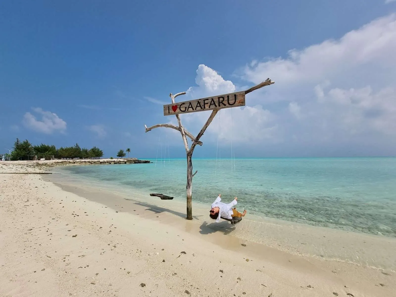 Gaafaru island swing with sign, Maldives
