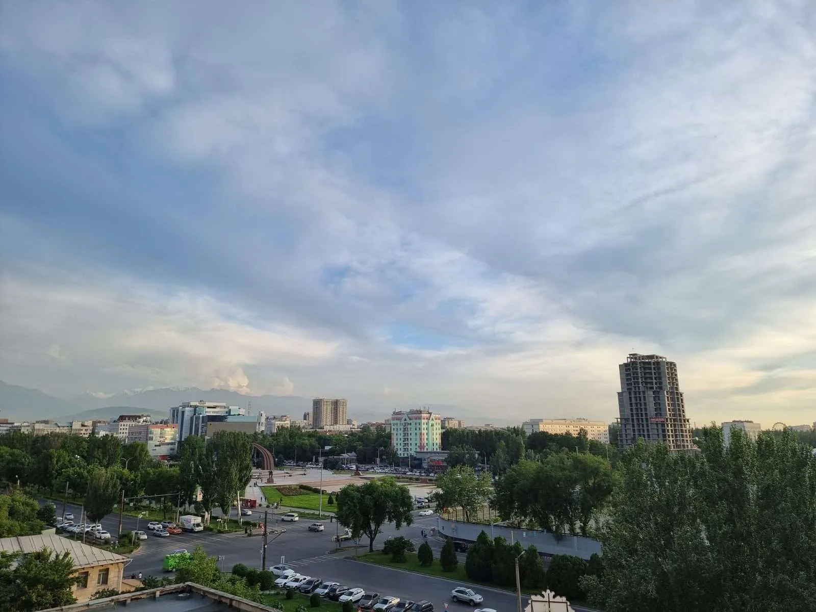 Bishkek - View from the hotel balcony over Victory square and the mountains