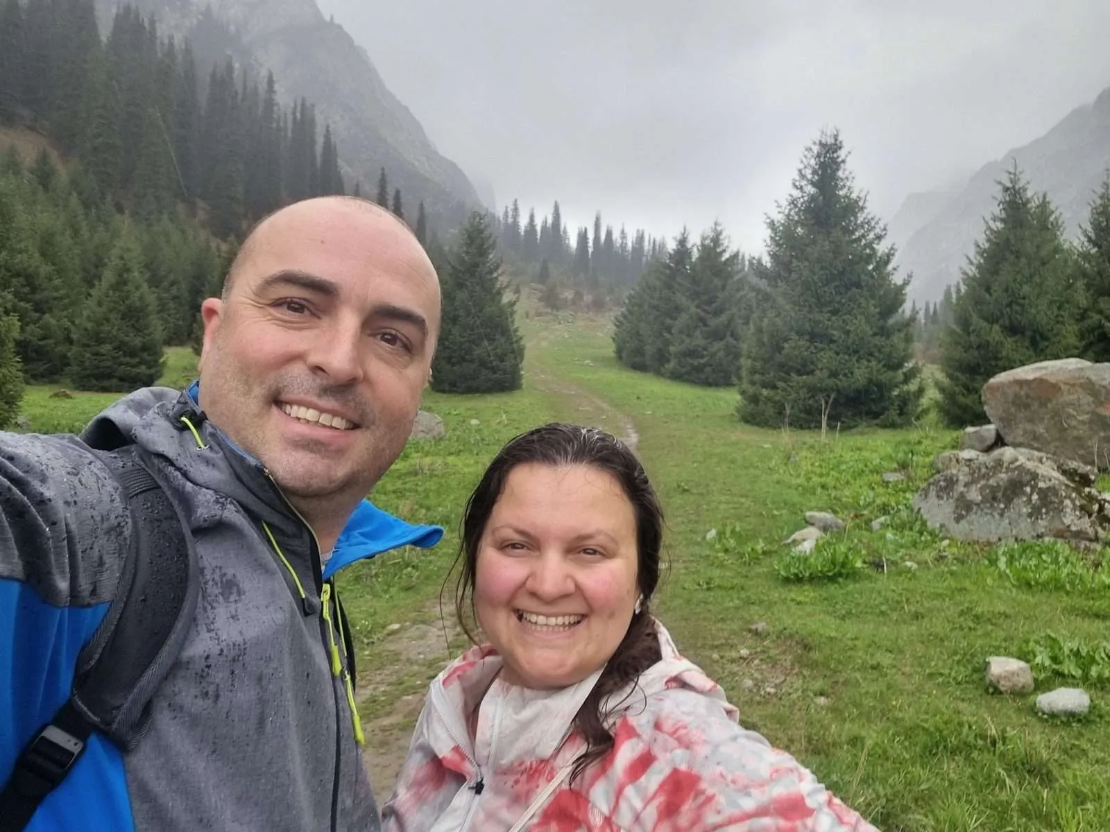 Ala Archa National Park Kyrgyzstan - Rainy and foggy green view behind Bistra and Nace