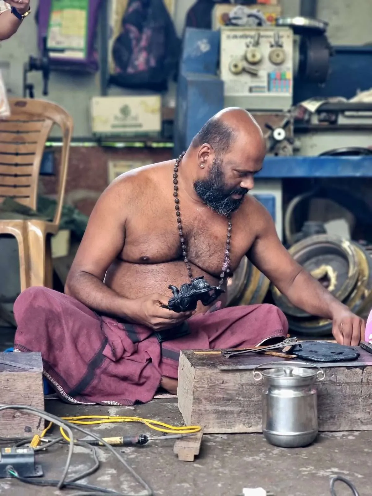 Handcrafting bronze in Kunhimangalam heritage village, Kannur, Kerala, India