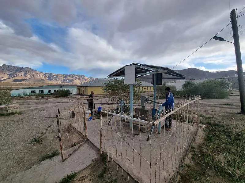 day 5 Pamir Highway Murgob locals getting water from the well
