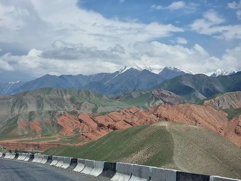 day 7 Pamir Highway Kyrgyzstan from Lake Tulpar-Kol to Osh Red colored mountains