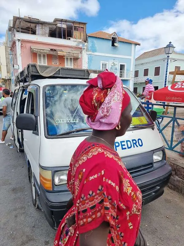 Cabo Verde Sao Vicente Sao Pedro well dressed local woman in front of the van